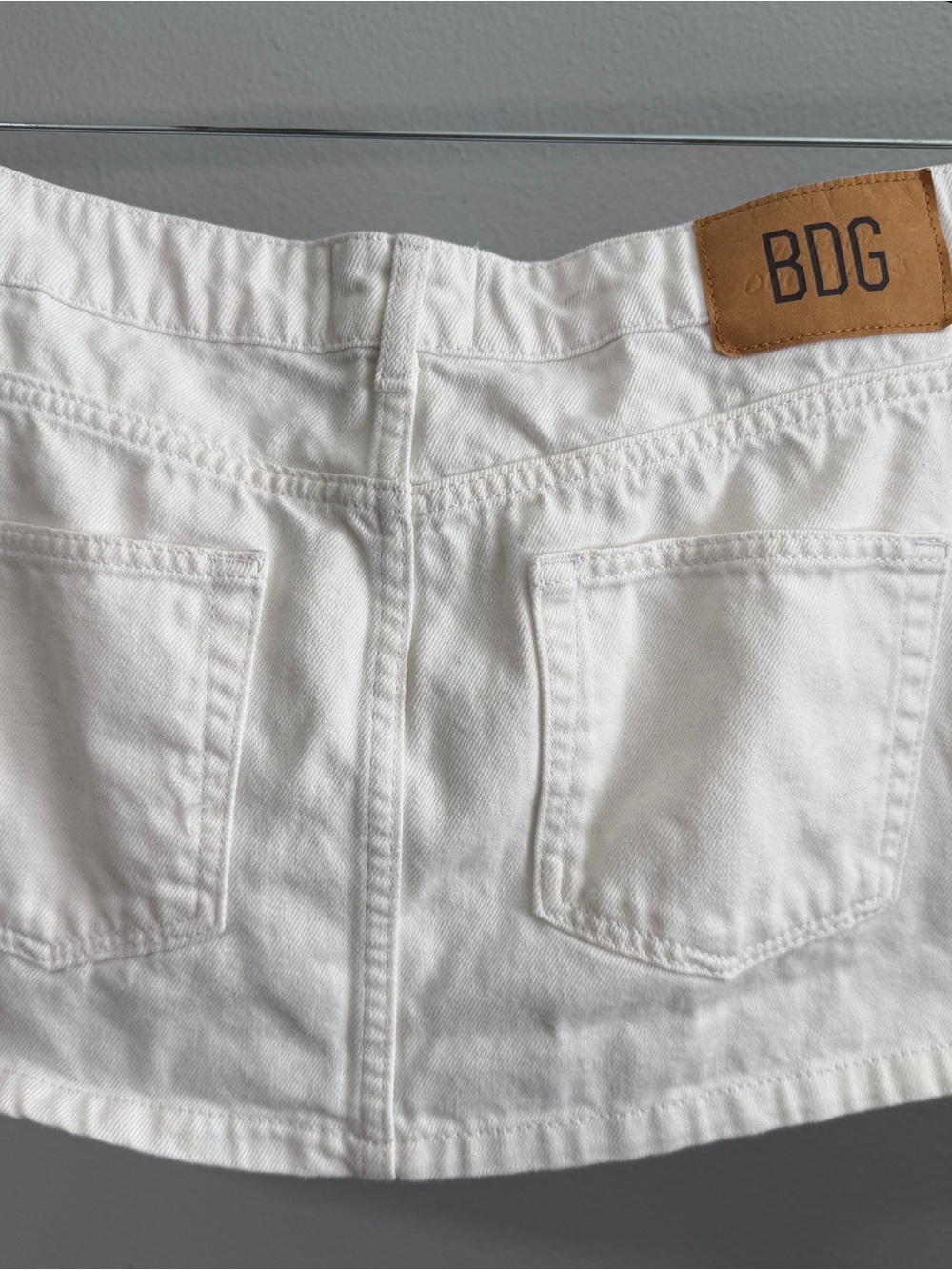 BDG White Denim Mini Skirt with Back Pockets